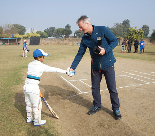 Steve Waugh shaking local Childs hand after a local game of cricket 