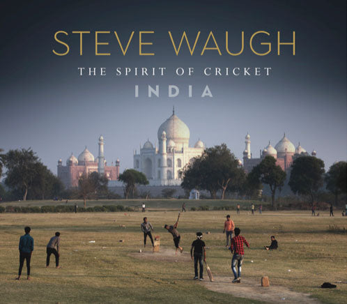 Book cover of the Steve Waugh, Spirit of Cricket in India Book. Cover image of locals playing on grasslands outside the Taj Mahal
